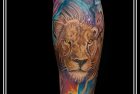 Тату Лев Цветной